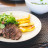 Beef steak with grilled pineapple and salad